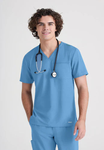 Polera Clínica Hombre GSST179 Celeste Ciel Blue Evolve Grey's Anatomy